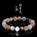 Unisex moonstone bracelet with colourful moonlight 8mm beads on a white background.