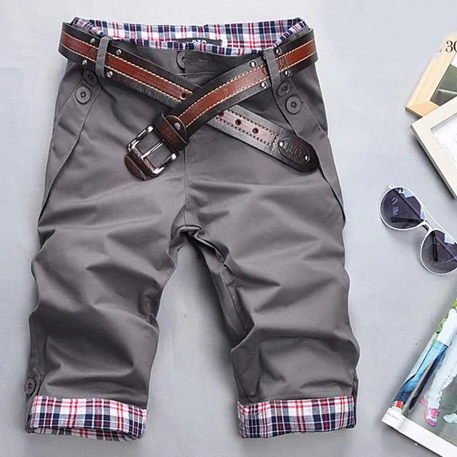 Men's cotton skinny 7-point casual pants in khaki, front view, showing cropped length and fitted silhouette