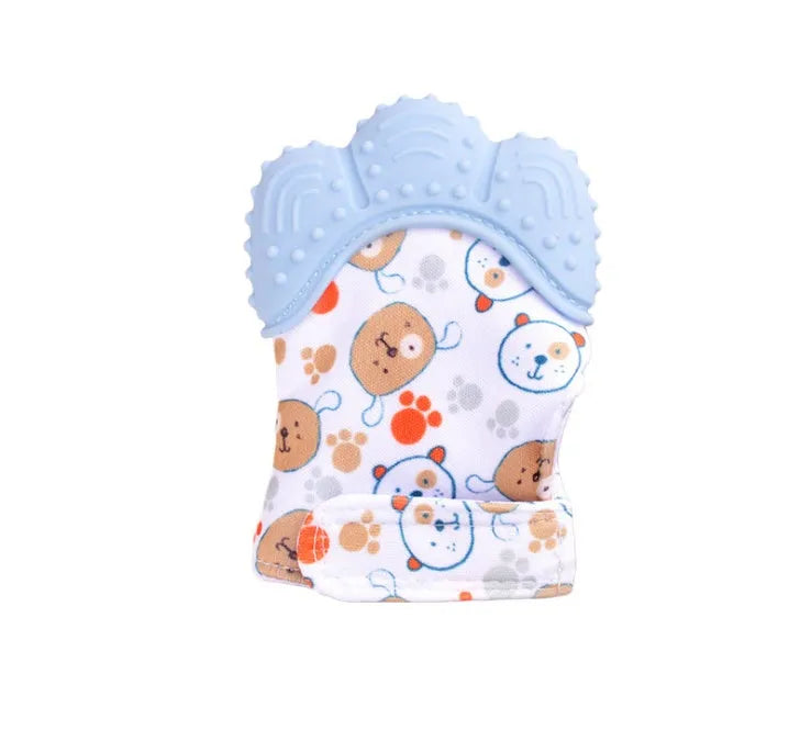 BPA-free silicone baby teether glove fastened with a white Velcro strap on a baby's hand