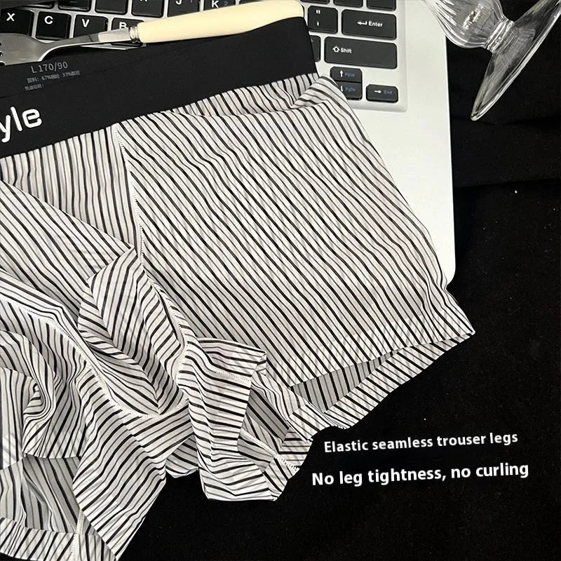 Men's black ice silk nylon boxer briefs with seamless mid waist design