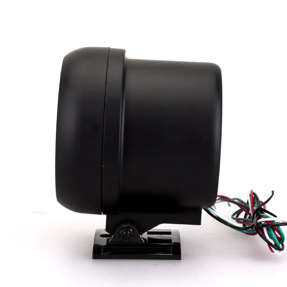 Black automotive tachometer with blue light pointer dial for measuring engine RPM.