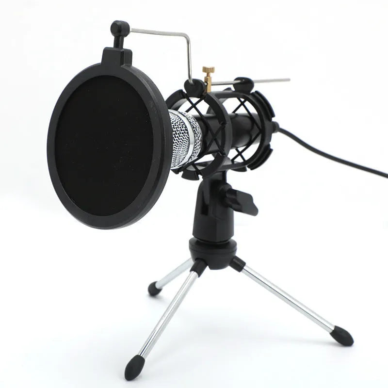 Black condenser microphone on stand with 3.5mm and USB cables for mobile and computer recording