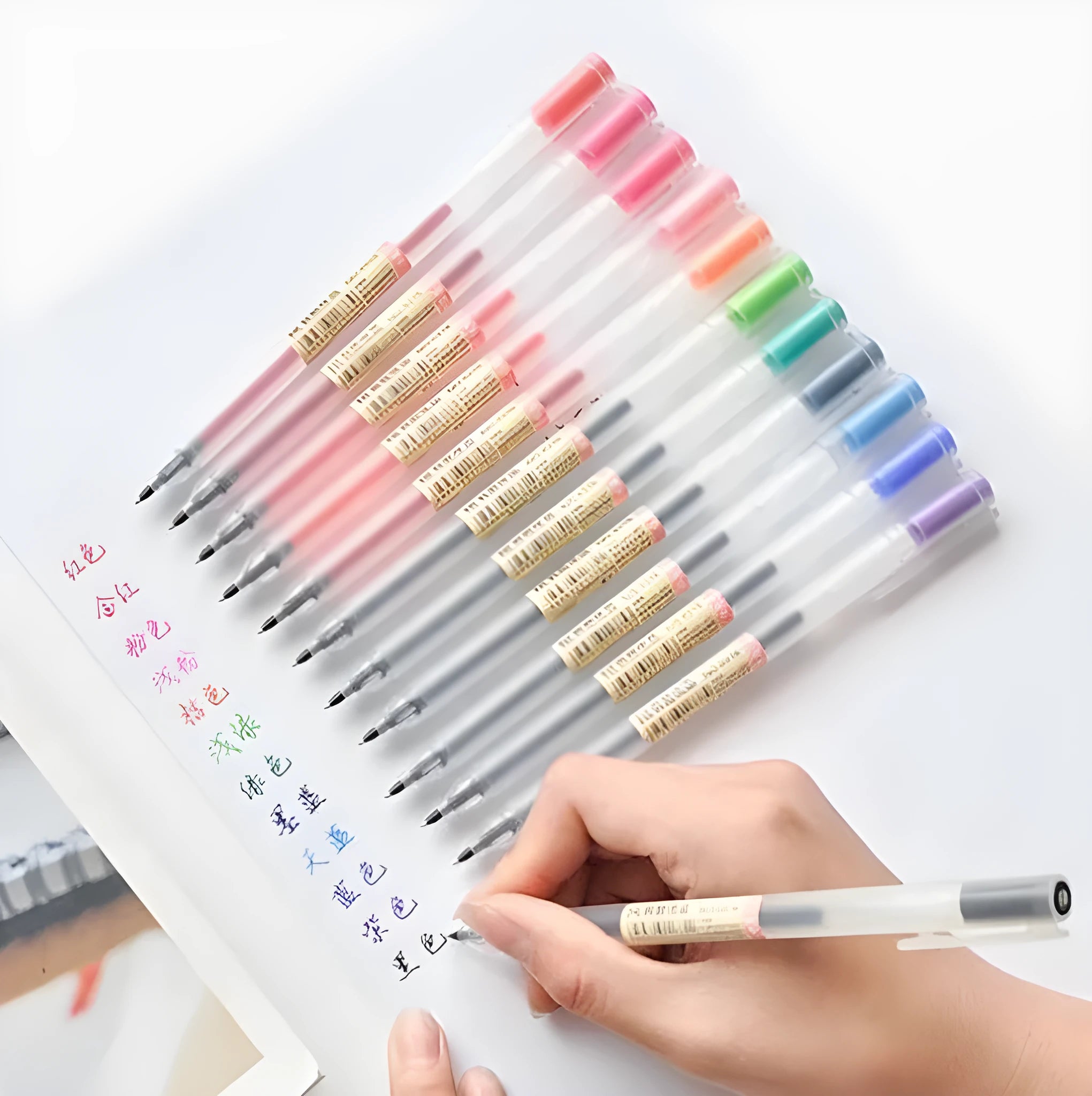 Box of twelve black Muji gel pens with 0.5mm nibs, showcasing leak-prevention design.