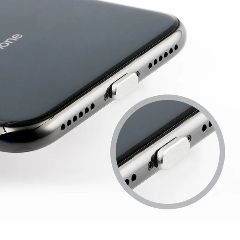Aluminium alloy charging port dust plug for iPhone in various metallic colours including gold and rose gold.