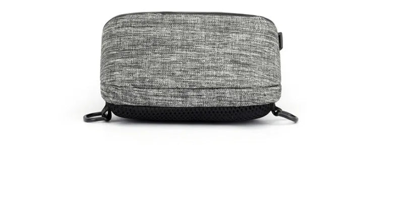Dark blue Oxford cloth chest bag with adjustable strap, shown open to reveal internal mobile phone pocket.