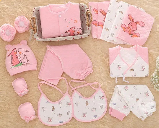 Pink cotton padded newborn baby clothes multi-piece set laid flat