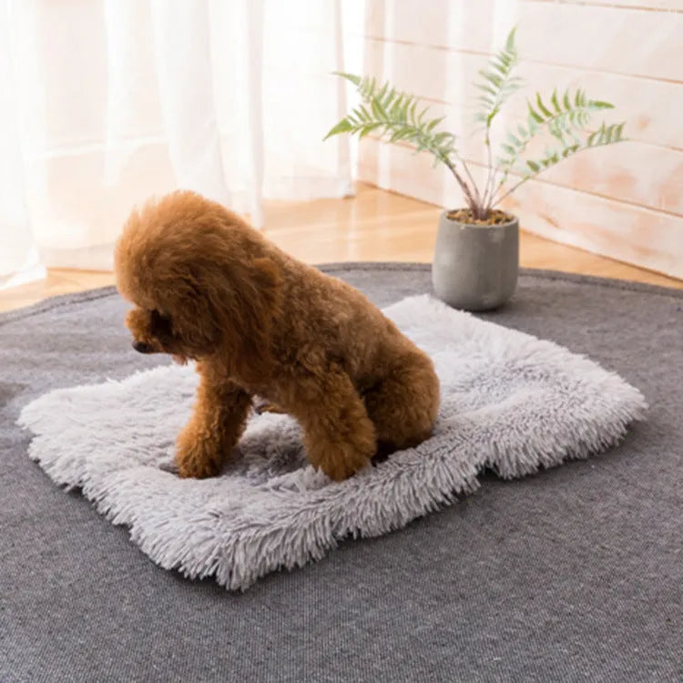 Plush pet nest with non-slip base, water-resistant material, available in multiple sizes and colours