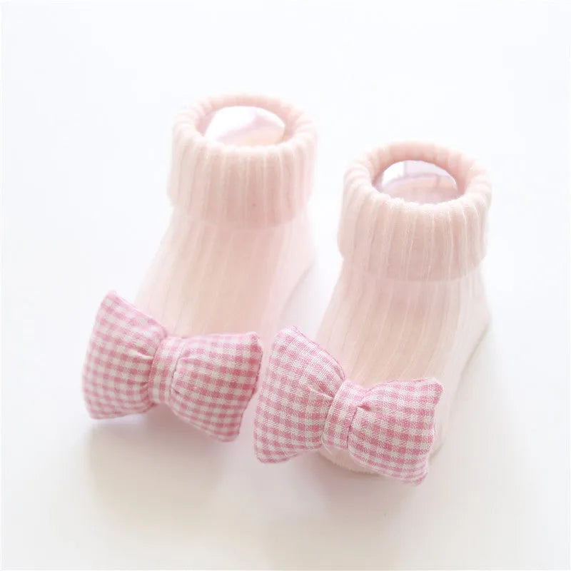 Cotton infant floor socks in multiple patterns with size options XS to M