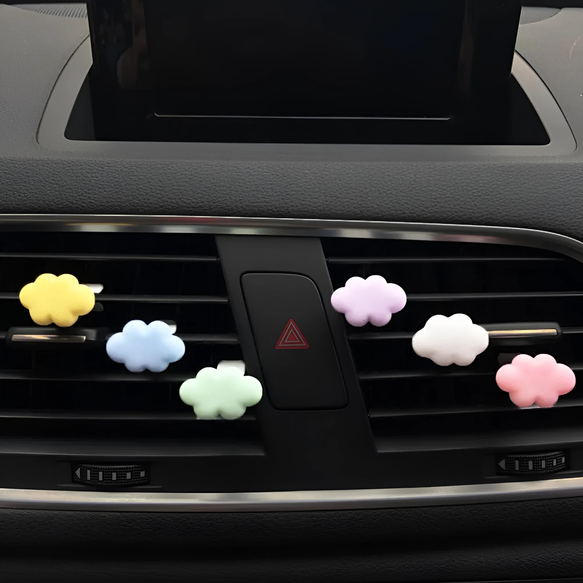 Resin Baiyun cartoon car fragrance clip for air vents in assorted colours.