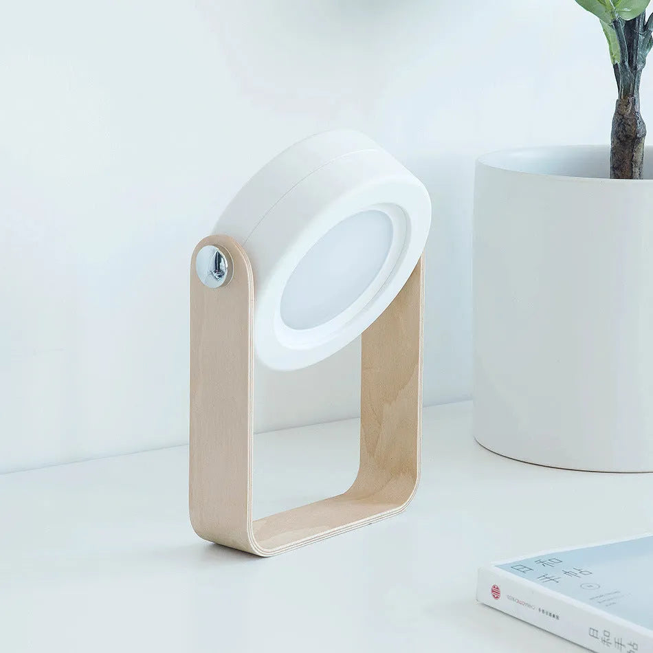 Foldable touch dimmable LED night light in white, showing both table lamp and expanded lantern modes.