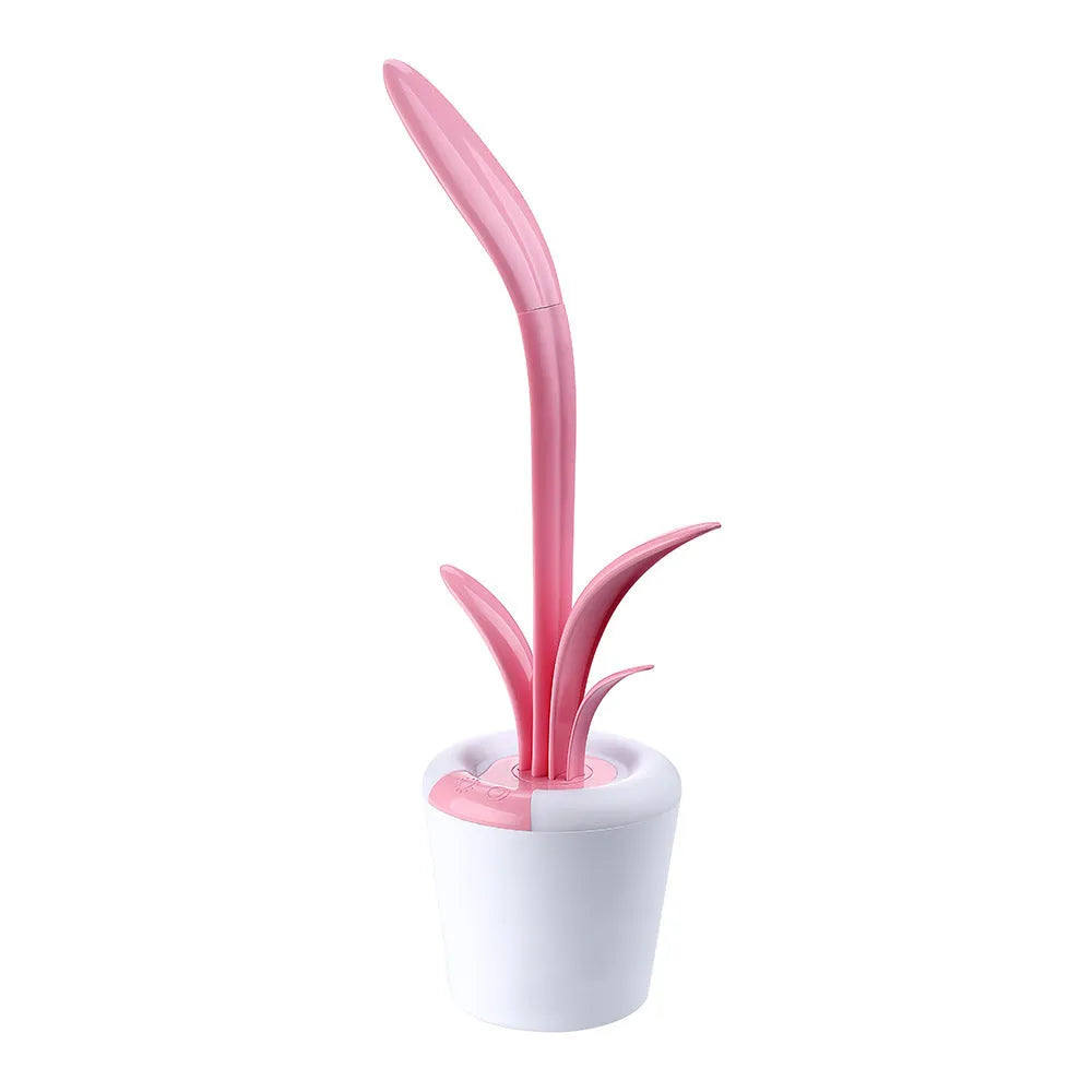 Modern rechargeable desk lamp with plant shape design in pink, showing touch control on a wooden end table