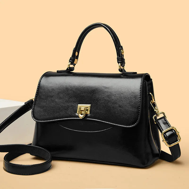 Women's large-capacity soft PU shoulder tote bag in black with horizontal square shape and sewing line detail