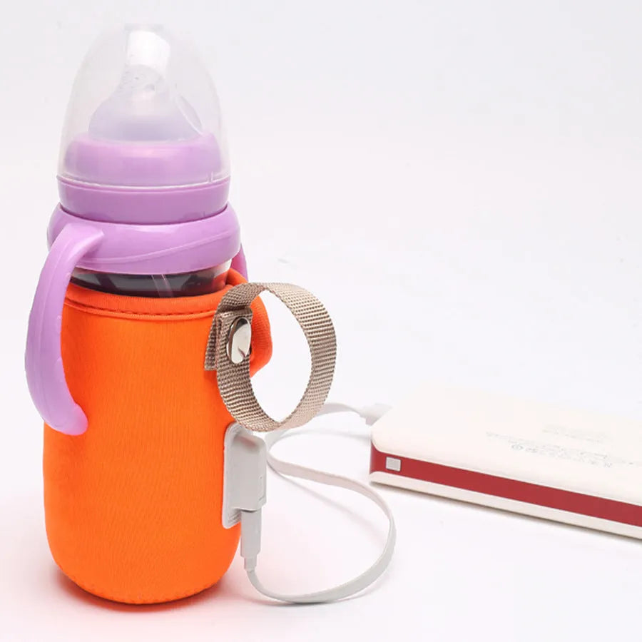 Long blue insulated cotton USB baby bottle warmer wrapped around a feeding bottle.