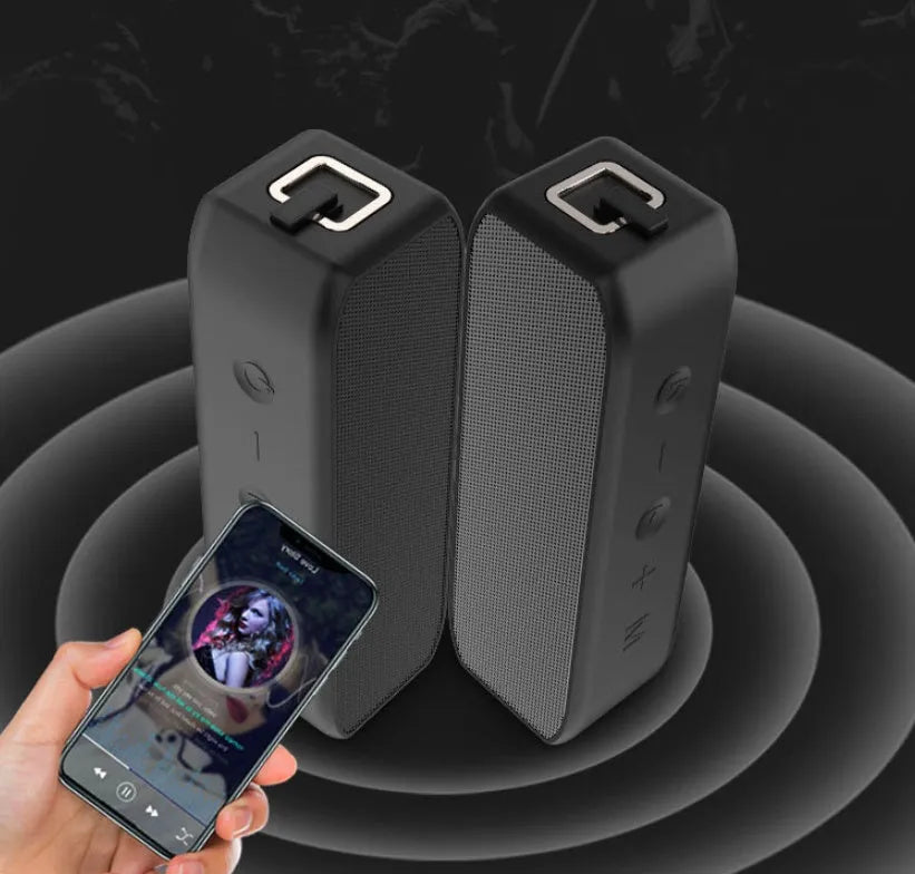 Black waterproof wireless Bluetooth speaker with 20W output and 12-hour battery