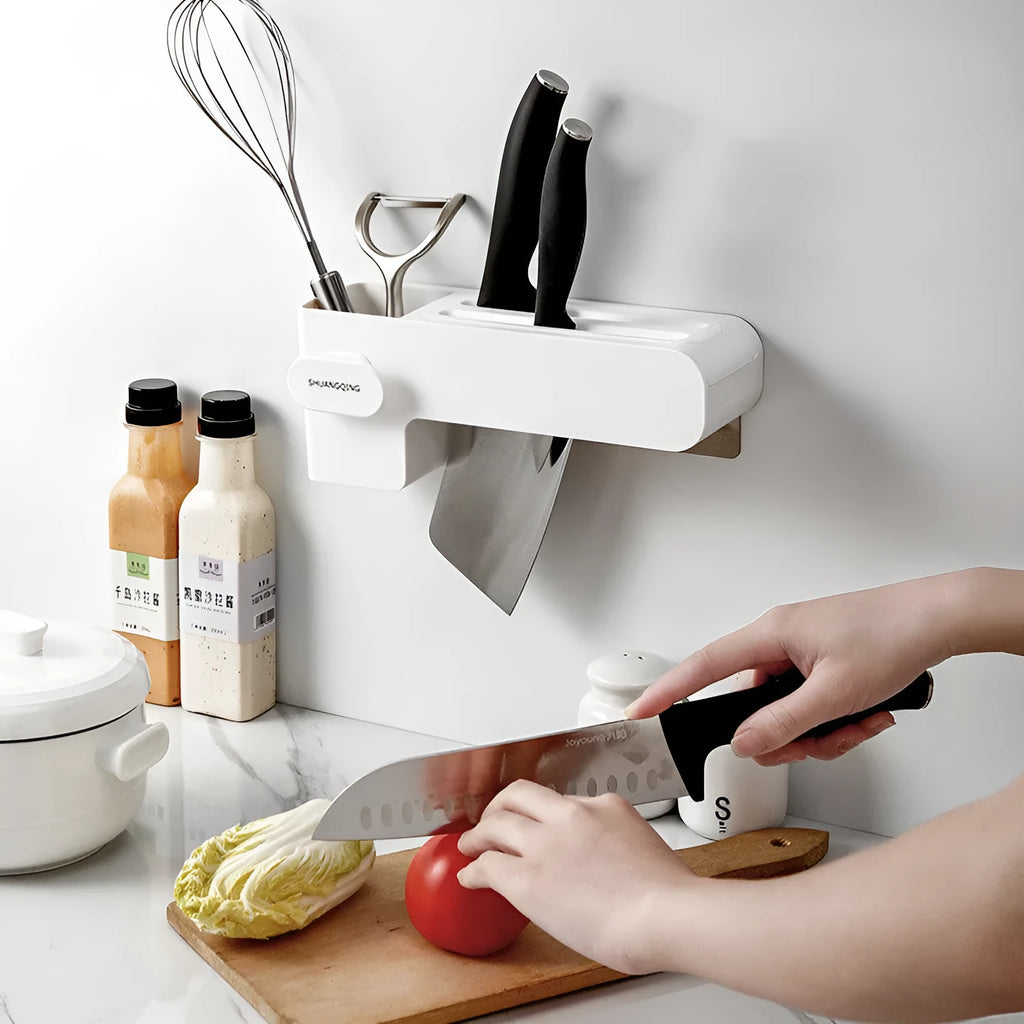 White plastic kitchen knife rack with modern simple design on countertop