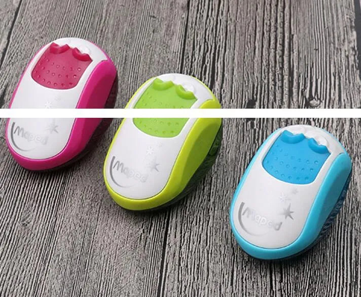 A double hole manual pencil sharpener in a random colour on a white background.