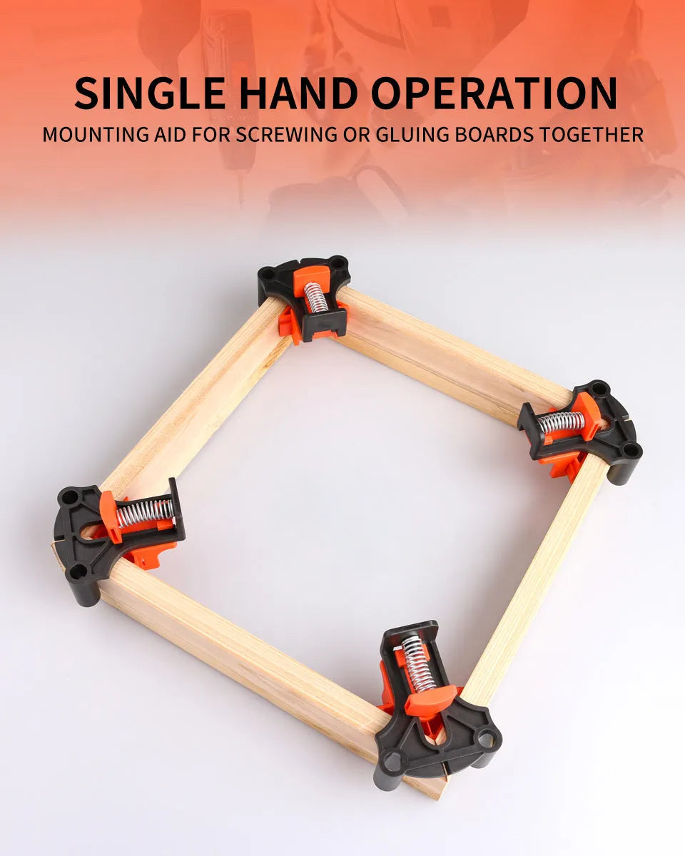 Four plastic 90-degree right-angle woodworking clamps for picture frame assembly.