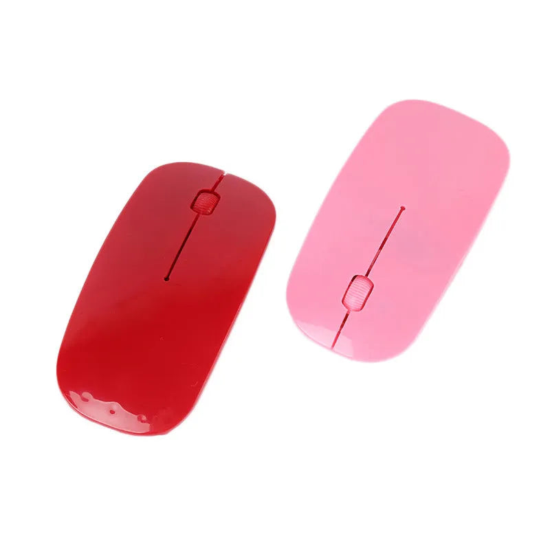 Wireless computer mouse in one of six colours: black, blue, green, pink, red, or white, with USB receiver