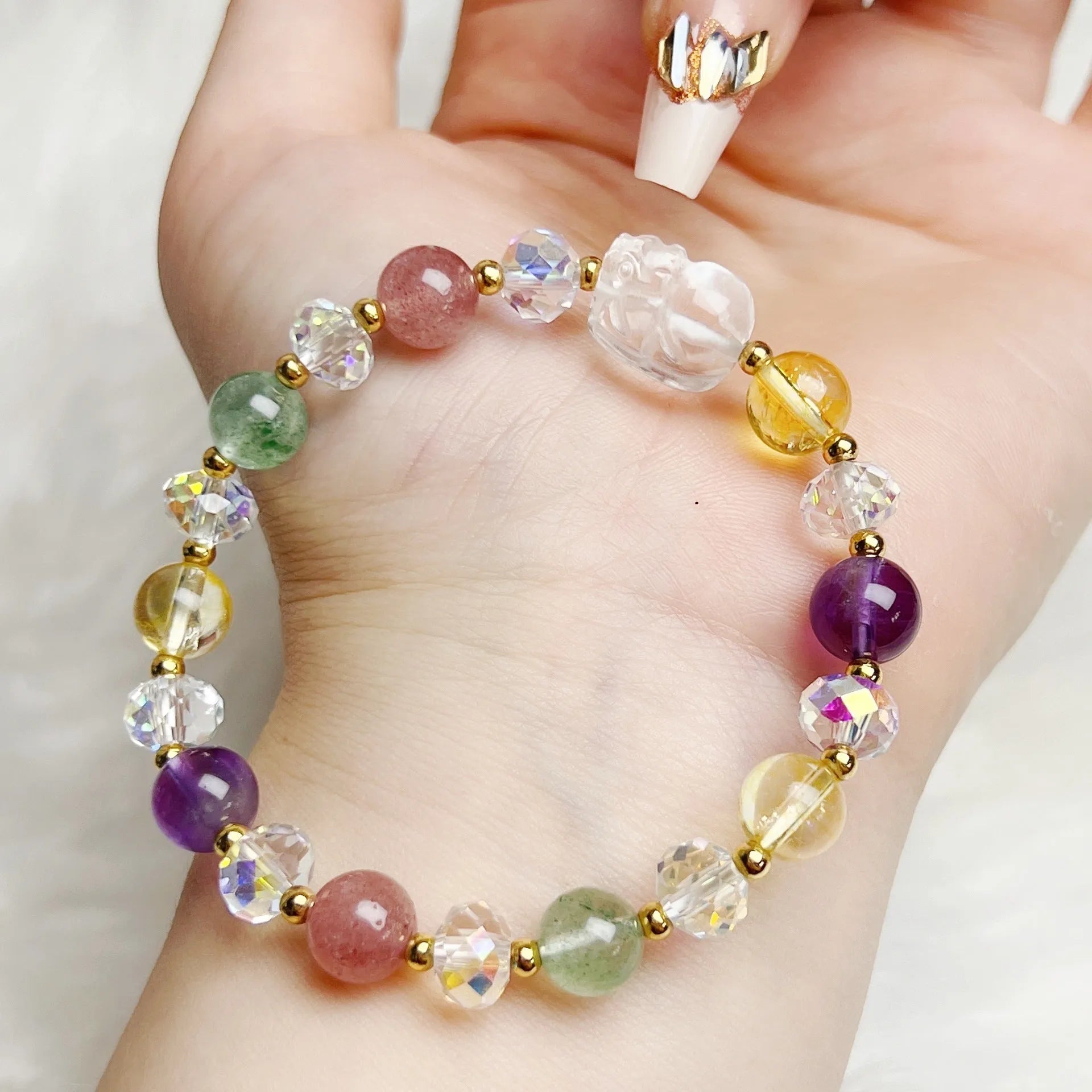 Handcrafted crystal bracelet featuring combined phoenix and nine-tail fox animal motifs