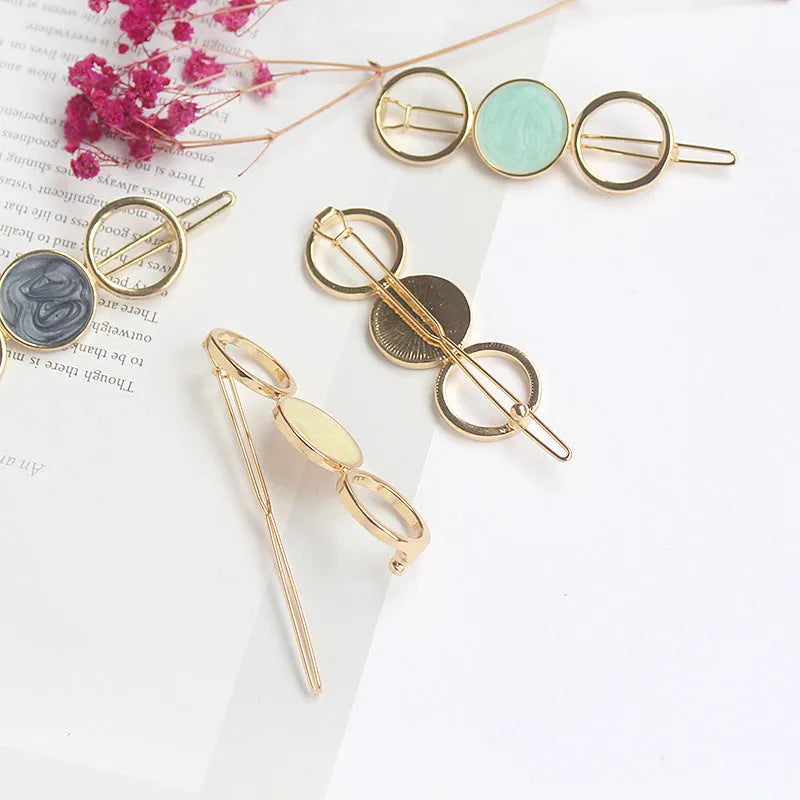 Round metal hairpin with opal crystal centre in beige colour, 7cm alloy construction