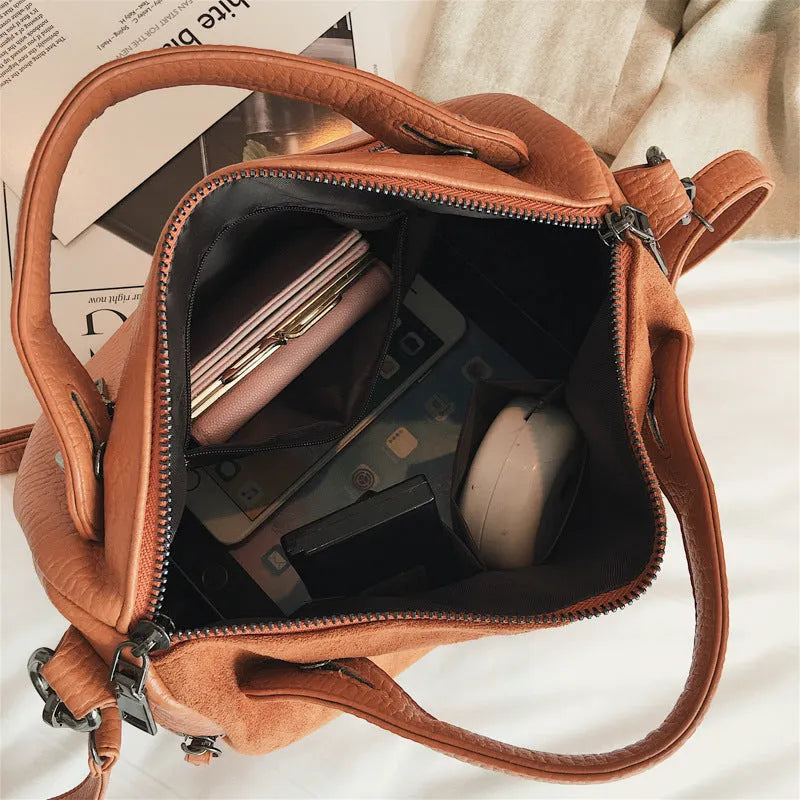 Soft PU leather women's casual tote shoulder bag in black, brown, or grey with zip closure.
