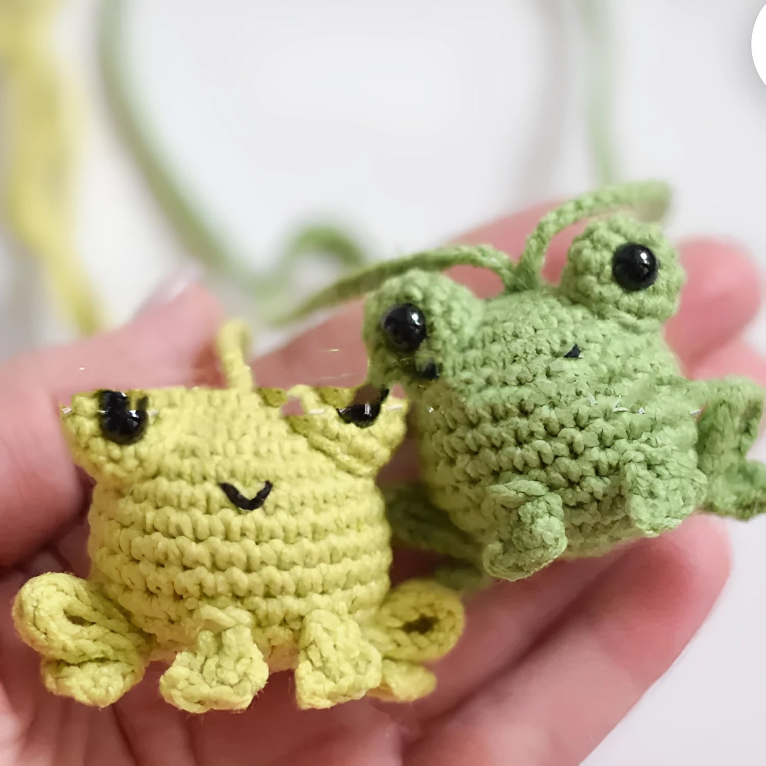 Handmade woven frog car pendant in plush material, green orange grass green colours