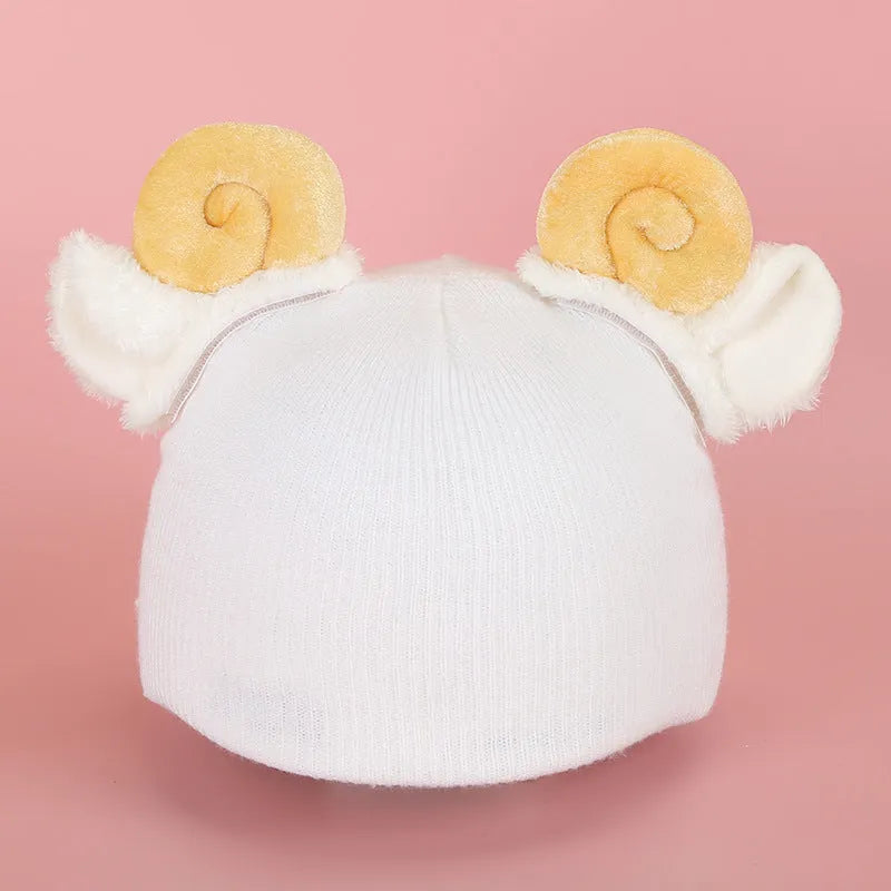 A soft plush cartoon character cover stretched over a medium-sized motorcycle helmet.
