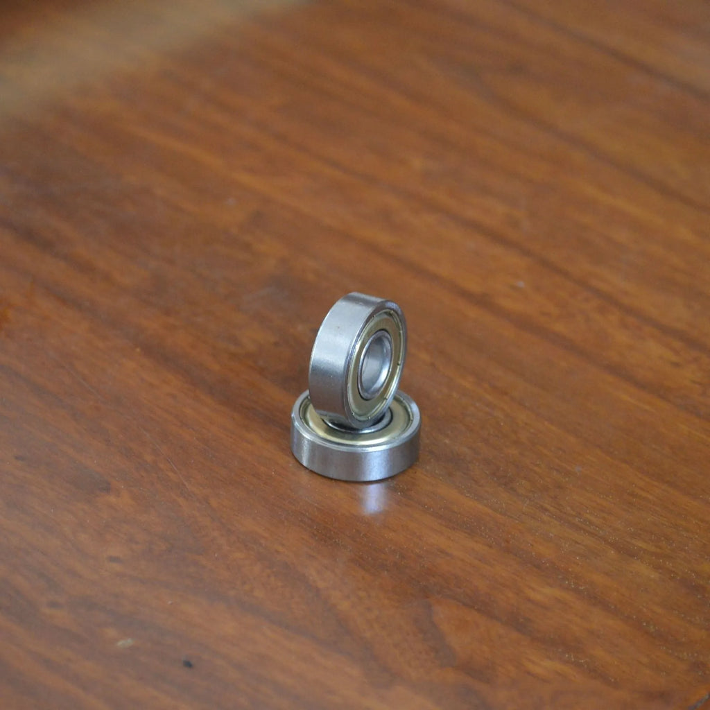 6000zz carbon steel deep groove ball bearing with 10mm inner diameter, 26mm outer diameter, and 8mm width.