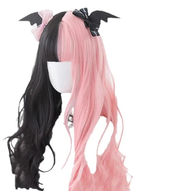 Long curly black and pink Lolita cosplay wig with a fringe on a display head.