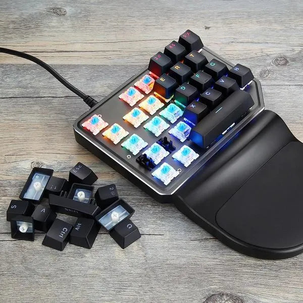 Motospeed black single-hand mechanical keyboard with 27 two-color keycaps in a ladder design; monochrome LED lighting on