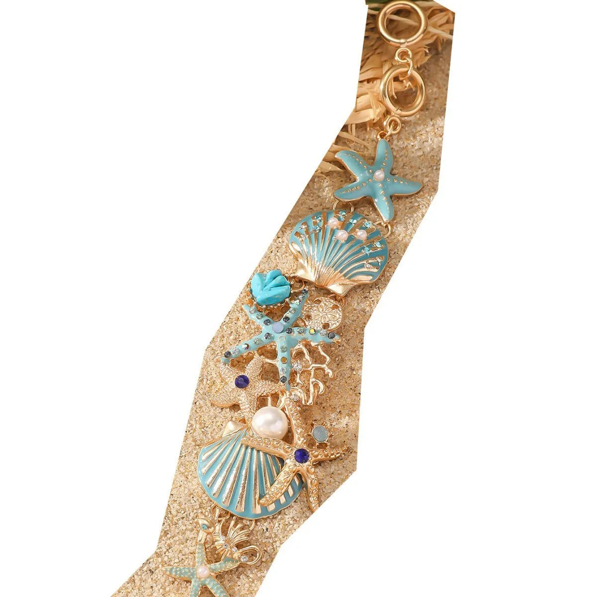 Women's alloy rhinestone nautical bracelet with starfish and anchor charms in turquoise, red, or blue.