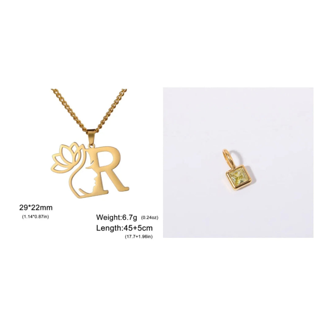 Gold electroplated stainless steel necklace with a cross chain and a letter 'A' pendant on a white background.
