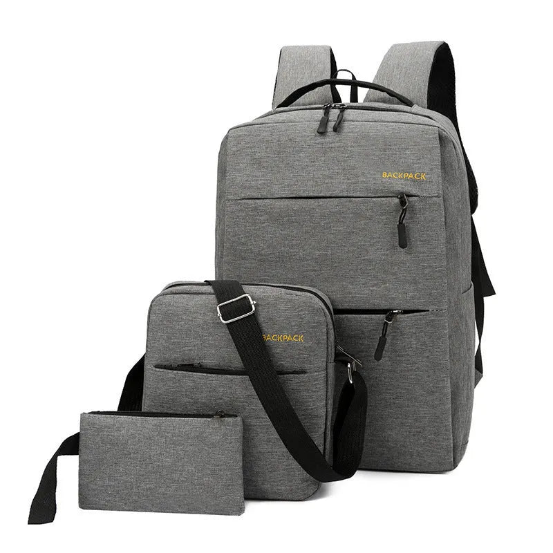 Men's black three-piece laptop bag set with USB charging port and padded straps on a grey background.