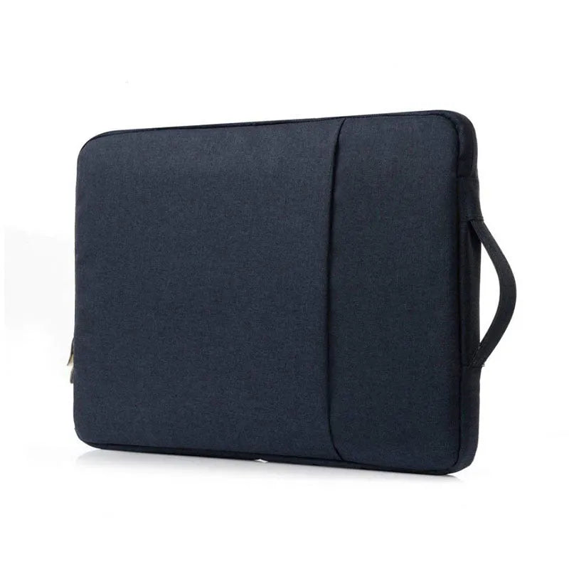 Grey canvas laptop sleeve case for a 12.9-inch iPad Pro, showing the YKK zipper and minimalist notebook design.