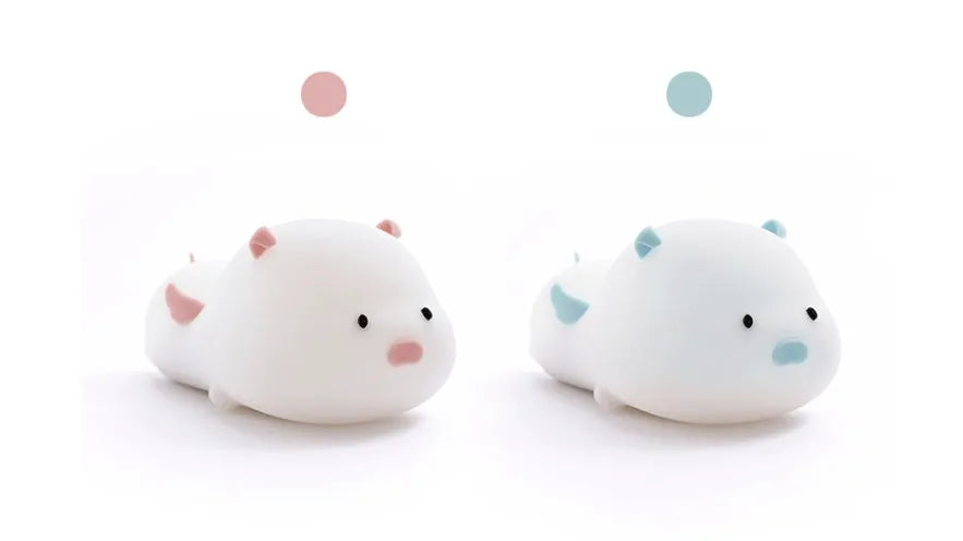 Blue silicone pig night light with sleeping expression and rechargeable battery