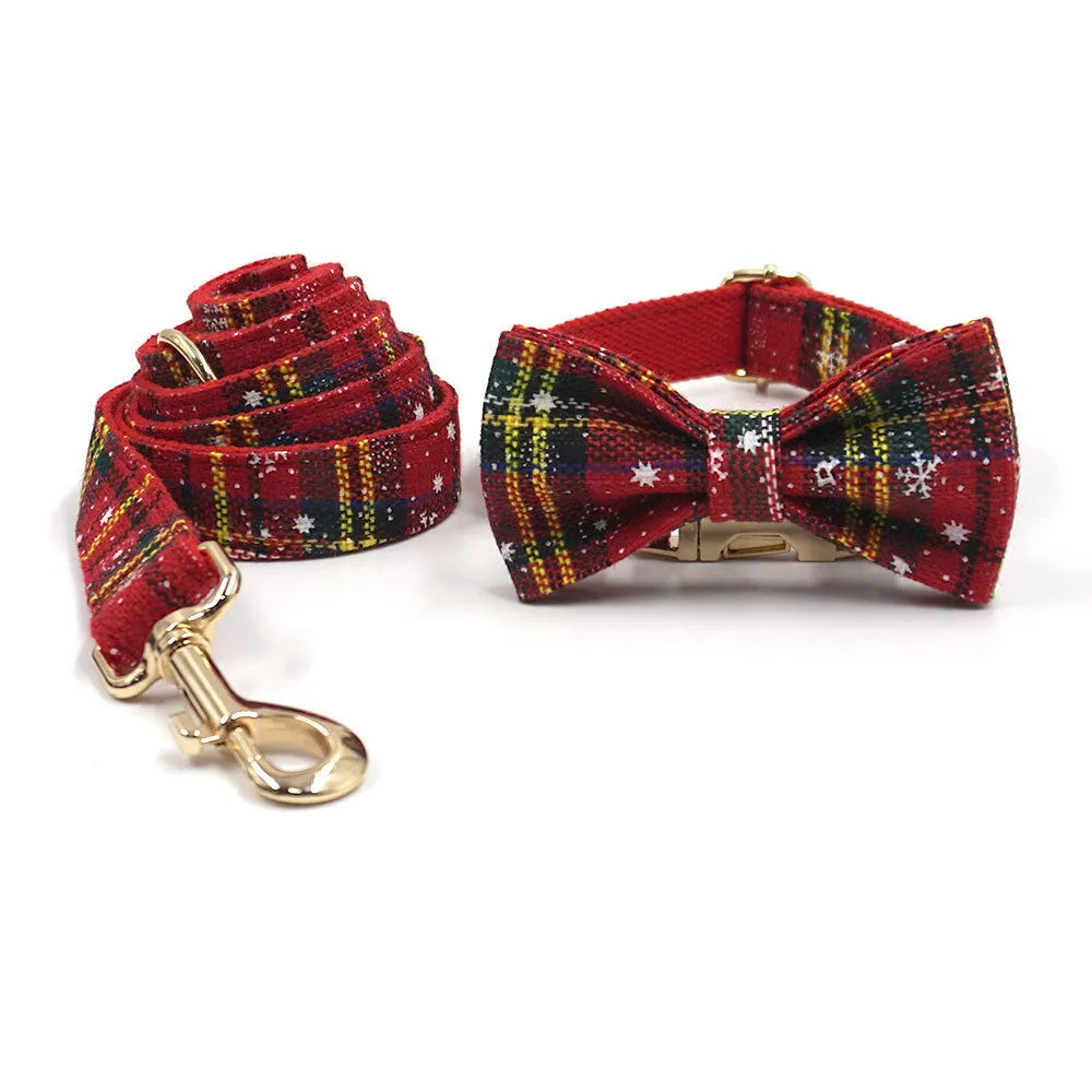 Red Christmas pet collar set with matching traction rope, bow, chest-back harness and waste bag holder