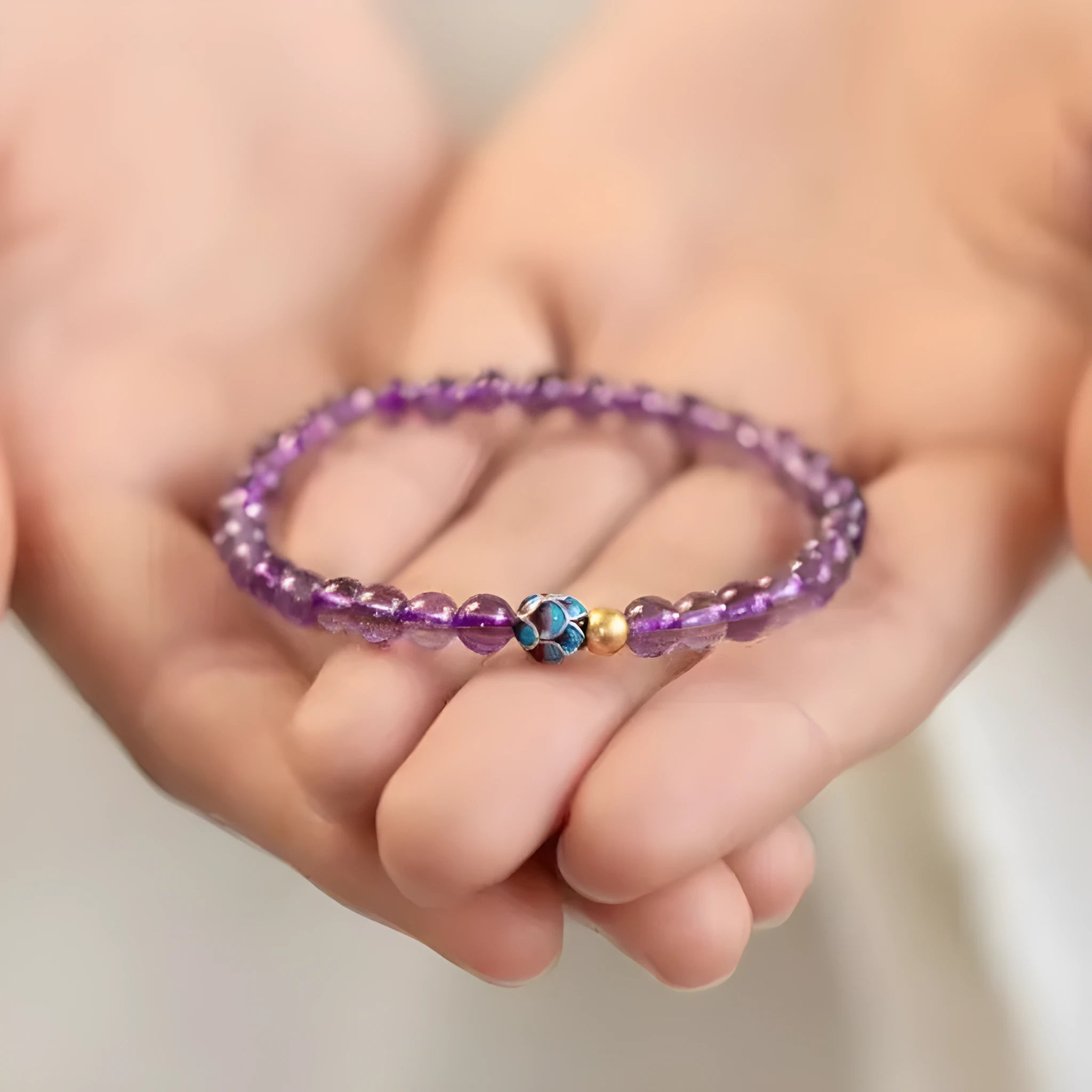 Nine purple lotus bracelet with mixed materials and retro styling for women.