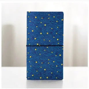 Japanese-style notebook with hand-painted cartoon cover showing one of seven available designs