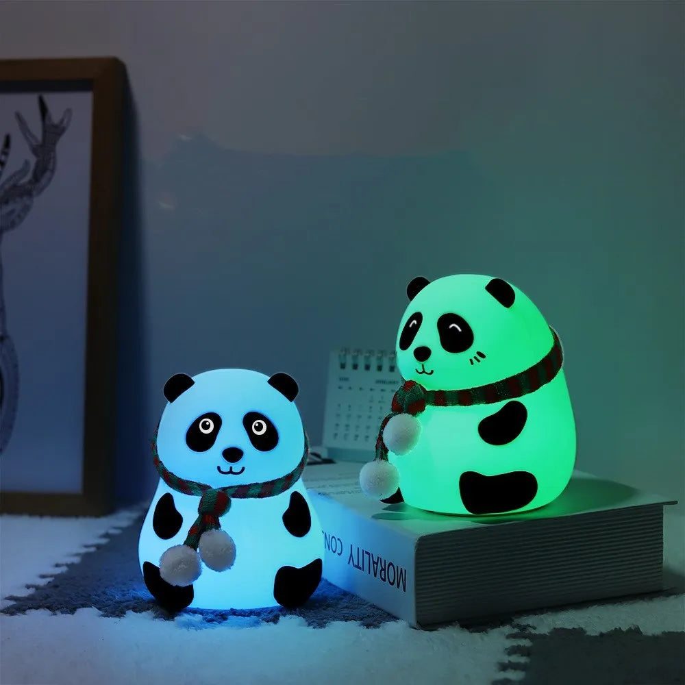 Panda-shaped silicone night light with USB charging port and compact design.