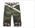 Men's cotton skinny 7-point casual pants in khaki, front view, showing cropped length and fitted silhouette