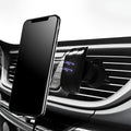 Matte black car phone holder mounted on air outlet with adjustable clamp and 360-degree rotation
