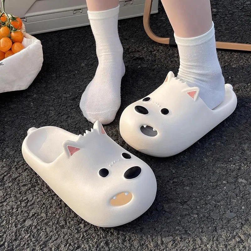 Women's black and white EVA puppy slippers with protective toe cap design