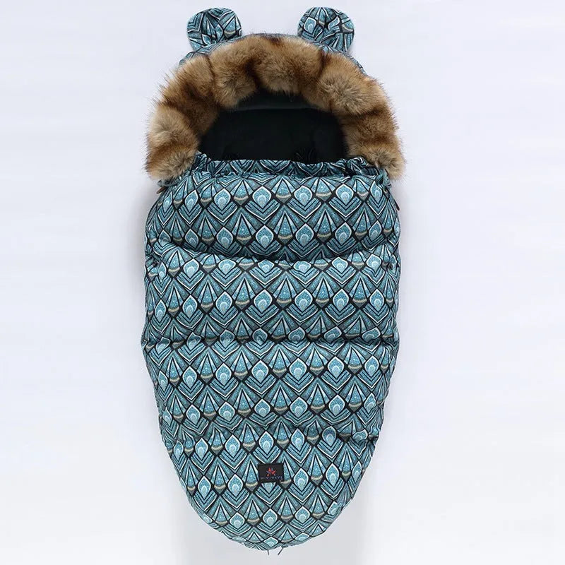 Baby warm cocoon style sleeping bag on a neutral background demonstrating solid colour design with zip closure