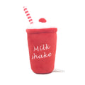 Soft plush dog toys shaped like a hamburger, french fries, and a milkshake cup with squeakers inside.