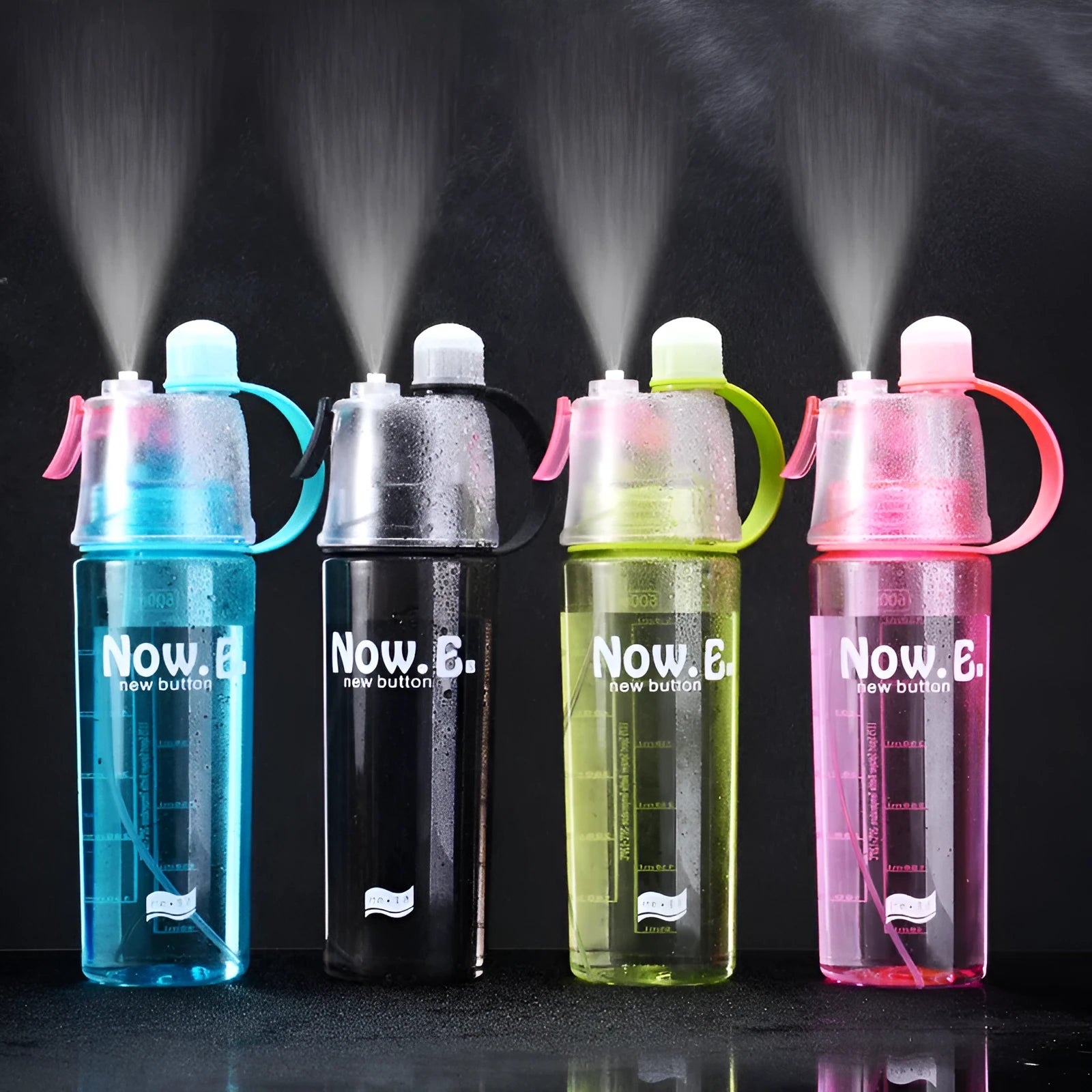 Green portable sports mist spray cup with transparent body, scale markings, and a black spray mouth cap.