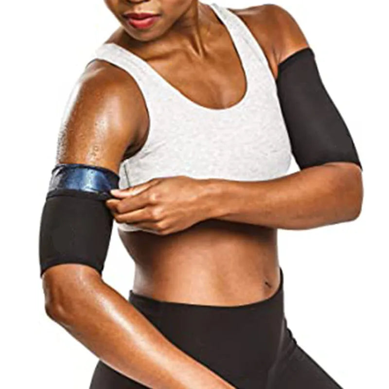 Compression sports arm sleeve in black and red colour, worn on forearm during workout.