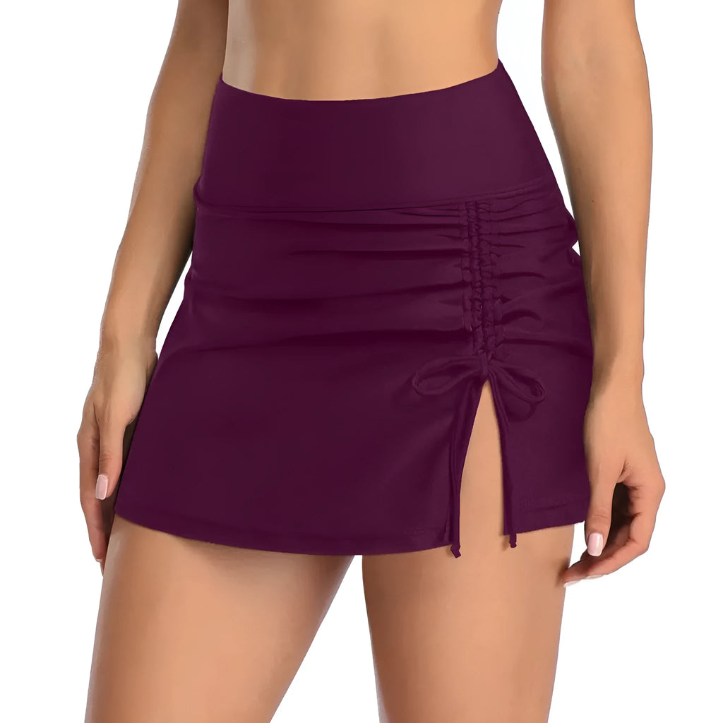 Women's solid colour lace-trimmed polyester swimming trunks in a briefs style on a white background.