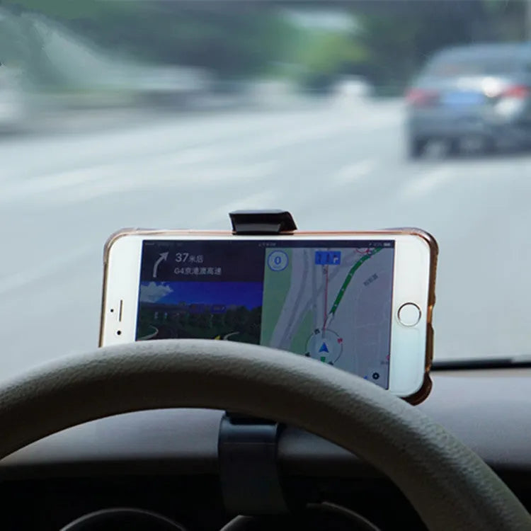 Rotary dashboard car phone holder in black with non-slip silicone clip for smartphones up to 6.5 inches
