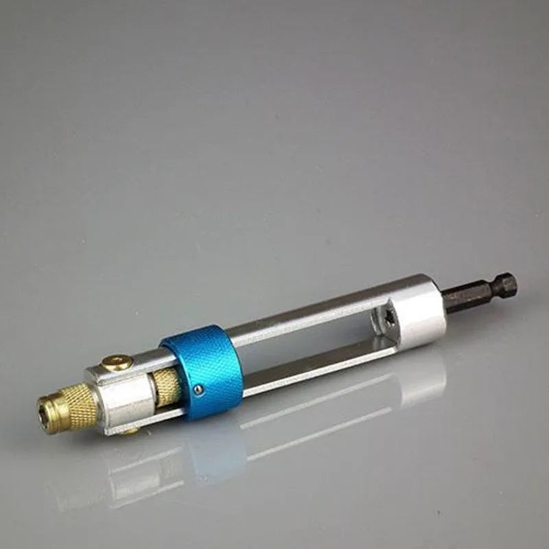Half Time Drill adapter kit with swivel head driver, Phillips bits, flathead bits, and countersink bits on a workbench
