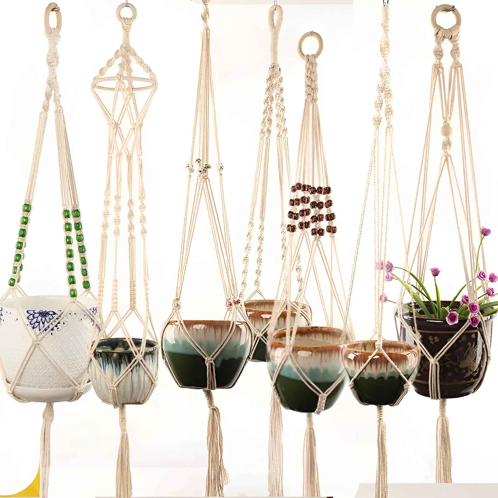 Woven cotton rope macrame plant hanger in a village style, shown as a desktop and wall-mounted planter.